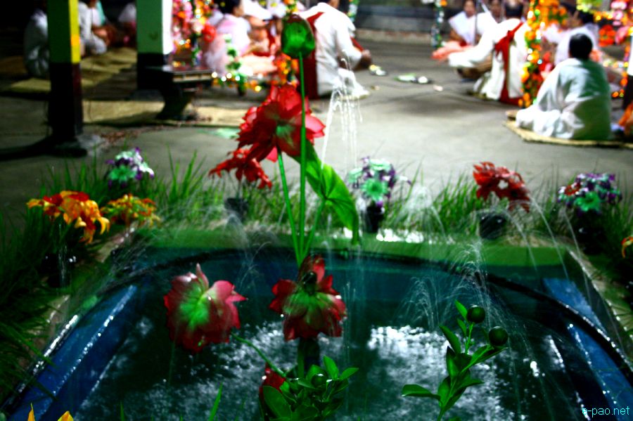 Devotees sing devotional songs at Mandop on occasion of Jhulon Festival at Khuyathong, Imphal :: July 30 2012