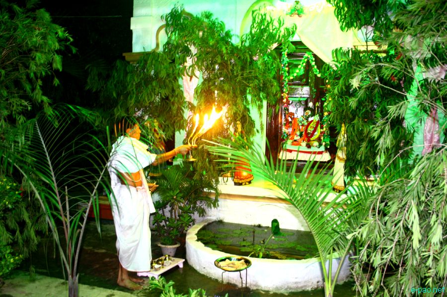 Devotees sing devotional songs at Mandop on occasion of Jhulon Festival at Khuyathong, Imphal :: July 30 2012