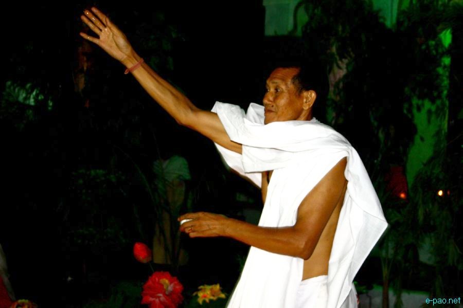 Devotees sing devotional songs at Mandop on occasion of Jhulon Festival at Khuyathong, Imphal :: July 30 2012