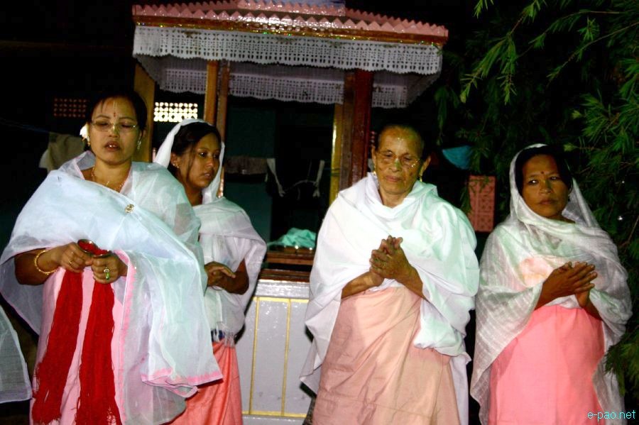 Devotees sing devotional songs at Mandop on occasion of Jhulon Festival at Khuyathong, Imphal :: July 30 2012