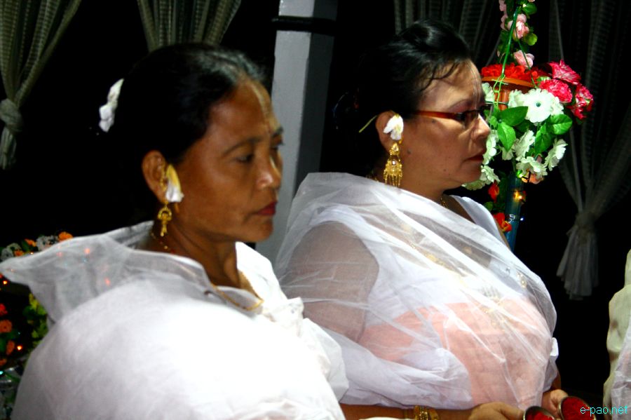 Devotees sing devotional songs at Mandop on occasion of Jhulon Festival at Khuyathong, Imphal  :: July 30 2012