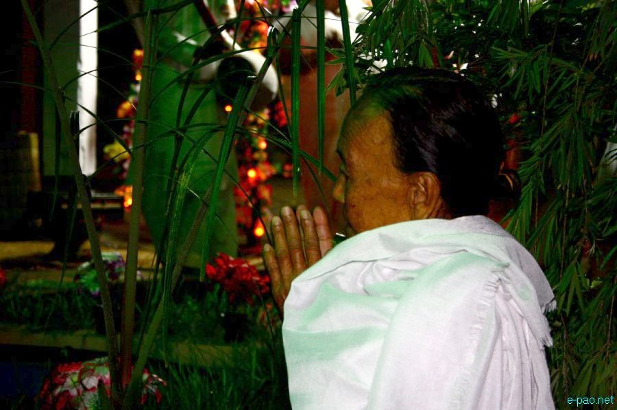 Devotees sing devotional songs at Mandop on occasion of Jhulon Festival at Khuyathong, Imphal :: July 30 2012