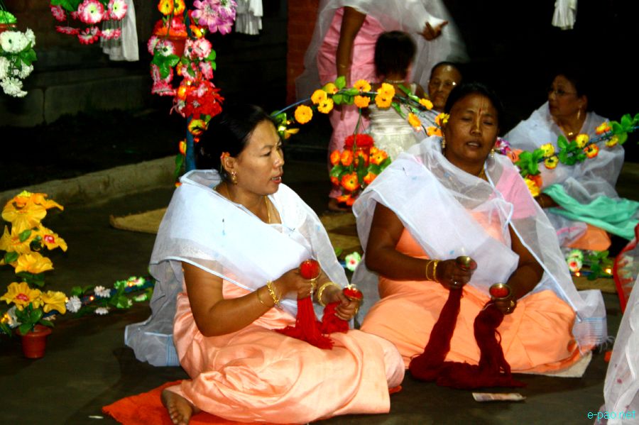 Devotees sing devotional songs at Mandop on occasion of Jhulon Festival at Khuyathong, Imphal :: July 30 2012