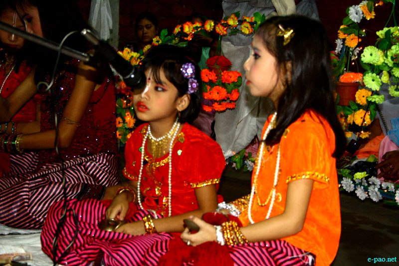 Devotees sing devotional songs at Mandop on occasion of Jhulon Festival at Khuyathong, Imphal :: August 02 2012