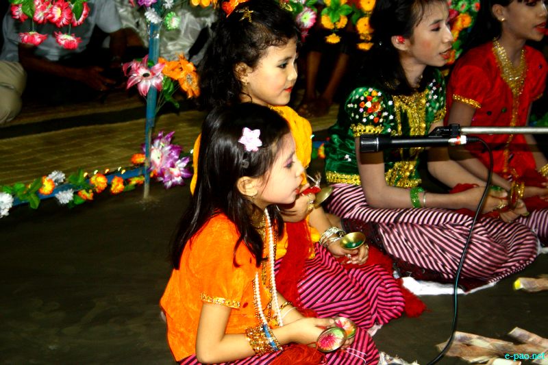Devotees sing devotional songs at Mandop on occasion of Jhulon Festival at Khuyathong, Imphal :: August 02 2012