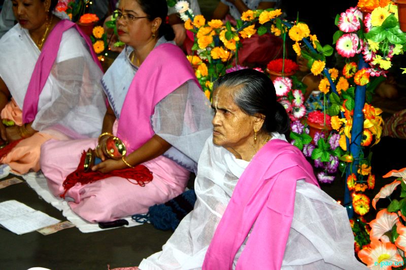 Devotees sing devotional songs at Mandop on occasion of Jhulon Festival at Khuyathong, Imphal :: August 02 2012
