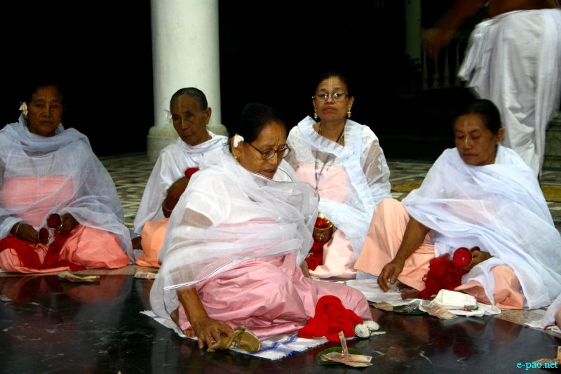 Devotees sing devotional songs at Mandop on occasion of Jhulon Festival at Kwakeithel, Imphal :: August 02 2012