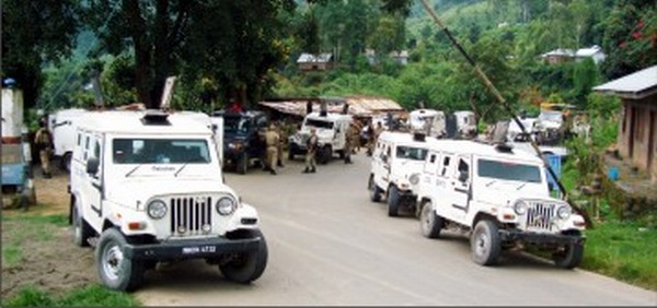 Security personnel getting ready to escort vehicles on NH-37