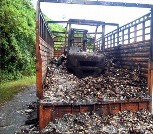 Charred remains of truck at a Sadar Hills area