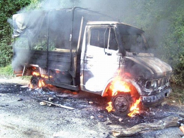 A 407 truck belonging to the police being burnt by UNC supporters  File photo