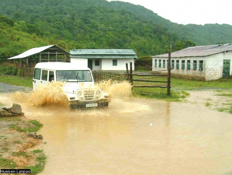 Monsoon Blues: stretch of road in Akui Kabulong village of Tamenglong district remains under water :: May end 2012