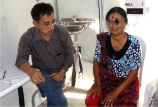 A patient being examined at a medical camp organised