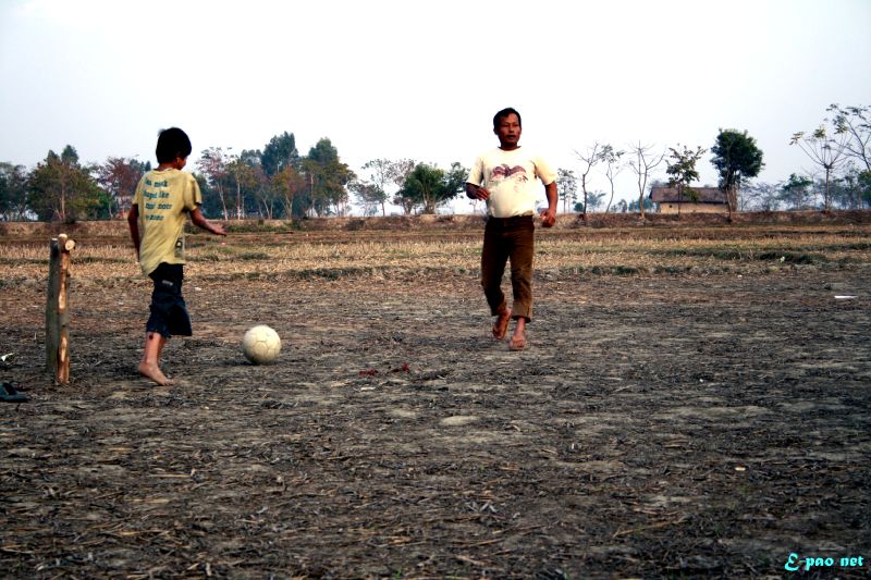 A Football Game in the Paddy Field :: February 2012
